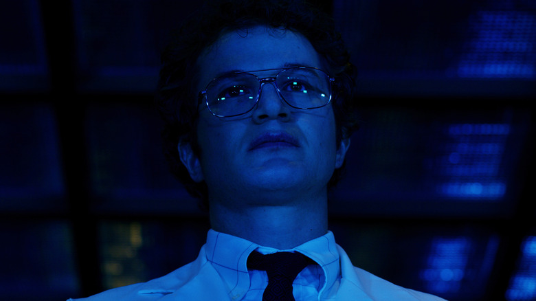 Russian scientist Alexei lit by blue light in Stranger Things