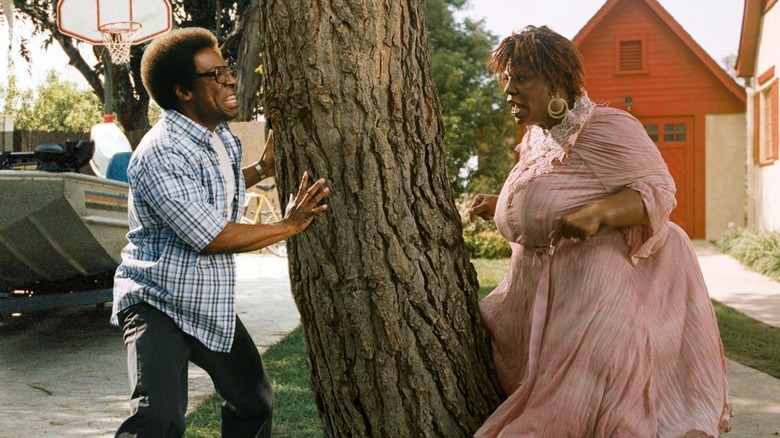Norbit and Rasputia running around a tree in Norbit