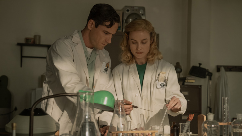 Calvin and Elizabeth working on an experiment in Lessons in Chemistry