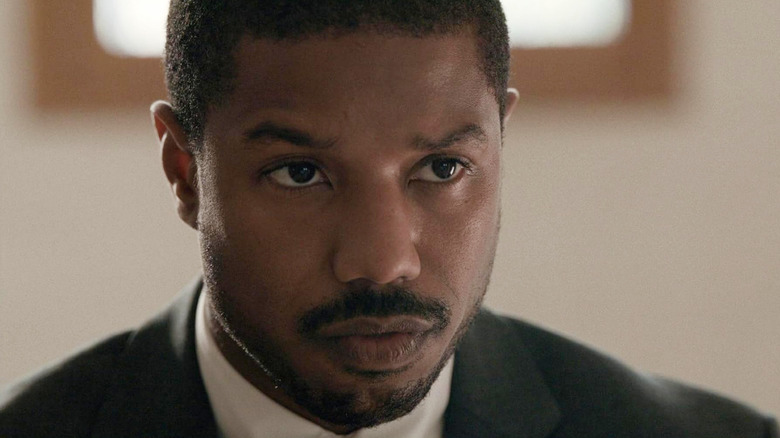 Michael B. Joran as Bryan Stevenson listening intently in Just Mercy