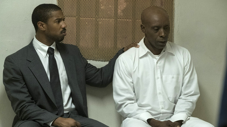 Michael B. Jordan as Bryan Stevenson comforting Rob Morgan as Herbert Richardson in Just Mercy