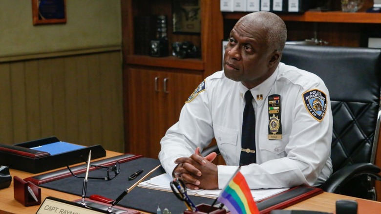 Captain Holt at desk