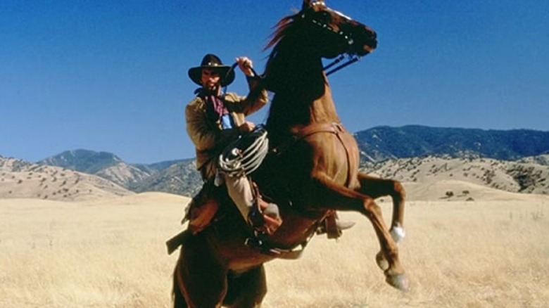 Brisco riding his horse in "The Adventures of Brisco County, Jr."
