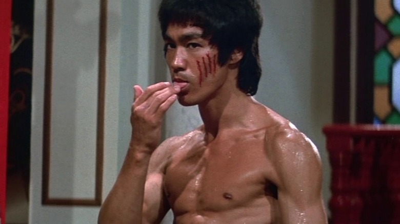 Bruce Lee ready to kick some *** in Enter the Dragon.