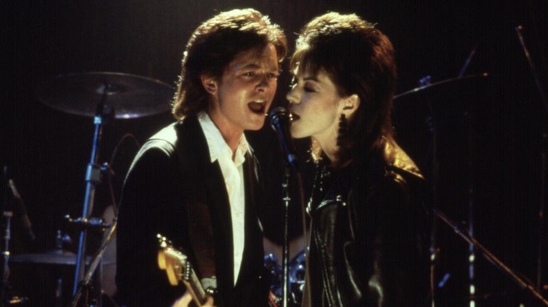 Michael J. Fox as Joe Rasnick and Joan Jett as Patti Rasnick rock a Cleveland bar in Light of Day