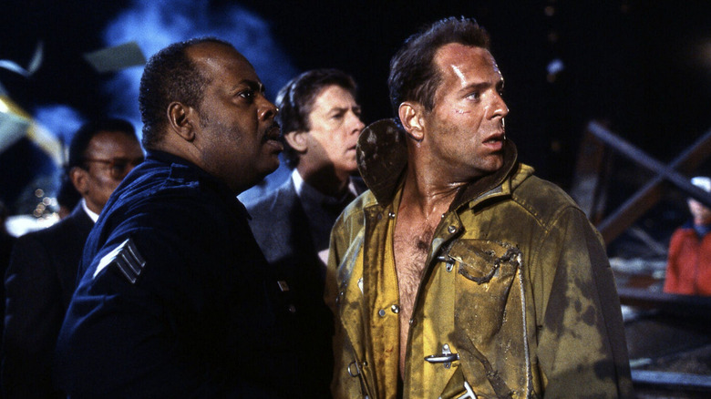 Bruce Willis and Reginald VelJohnson in Die Hard