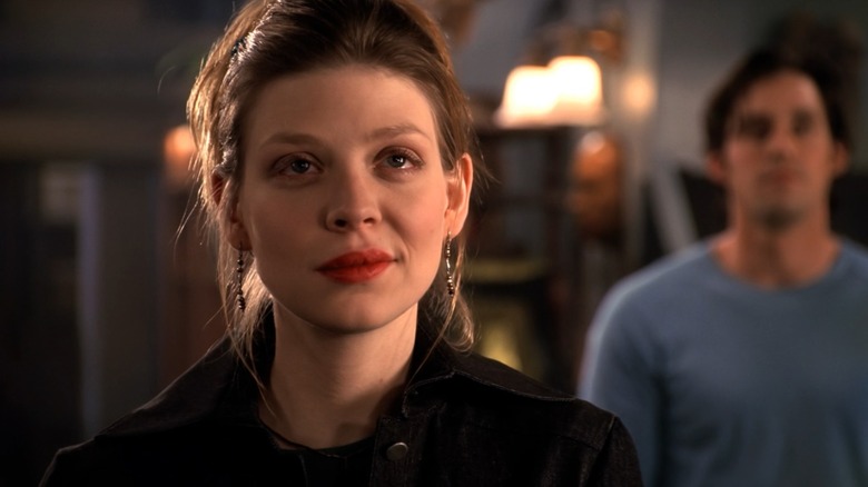 Amber Benson as Tara on Buffy the Vampire Slayer, smirking