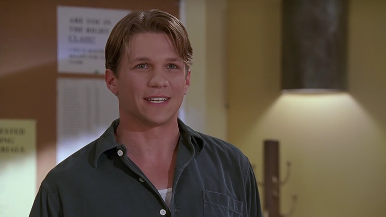 Marc Blucas as Riley on Buffy the Vampire Slayer smiling happily