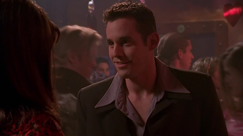 A goofy-looking Nicholas Brendon as Xander on Buffy the Vampire Slayer, in the nightclub