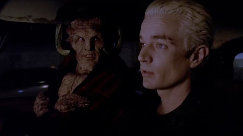 Spike and a demon sitting in a car in "Buffy the Vampire Slayer"