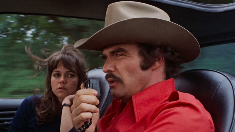 Carrie and the Bandit in the front seat of a car in Smokey and the Bandit