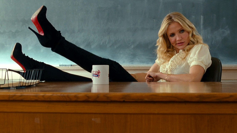 Elizabeth with her Louboutin heels up on the desk in Bad Teacher