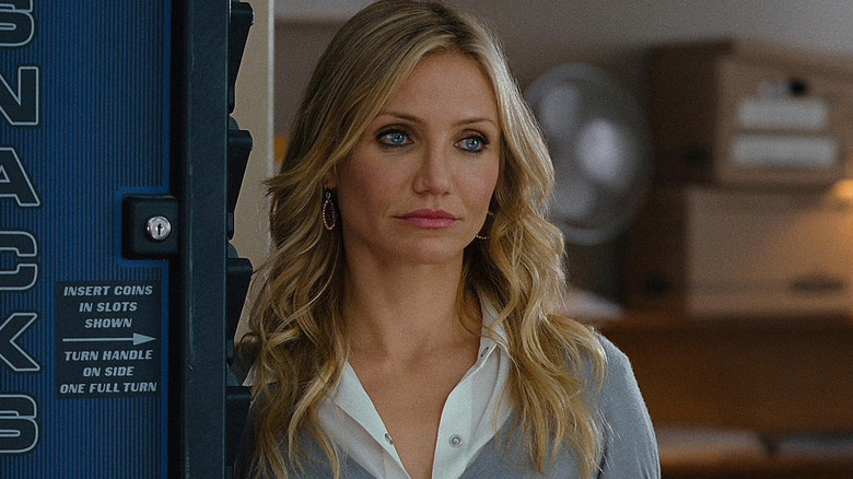 Elizabeth standing next to a vending machine in Bad Teacher
