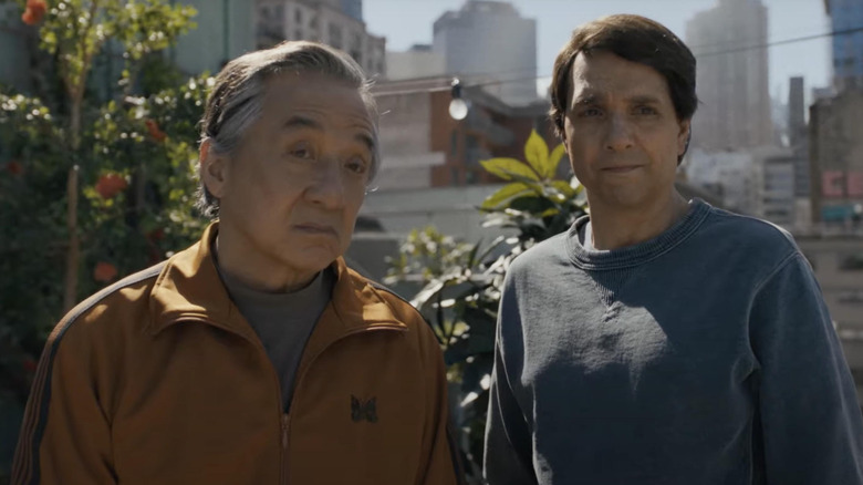 Jackie Chan as Mr. Han and Ralph Macchio as Daniel LaRusso on the roof in Karate Kid: Legends