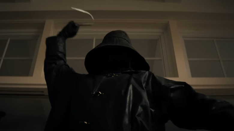 The Fisherman swinging his hook at a victim in I Know What You Did Last Summer (2025)