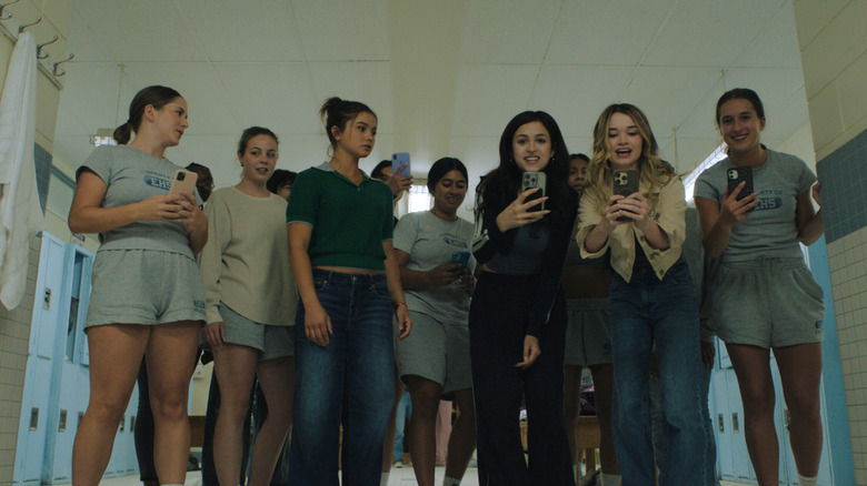 Carrie (2026) - Sue, Tina, Chris and other girls mocking/filming Carrie in the shower room