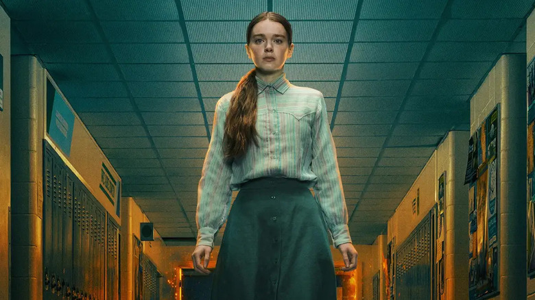 Carrie (2026) poster showing Carrie White in burning hallway