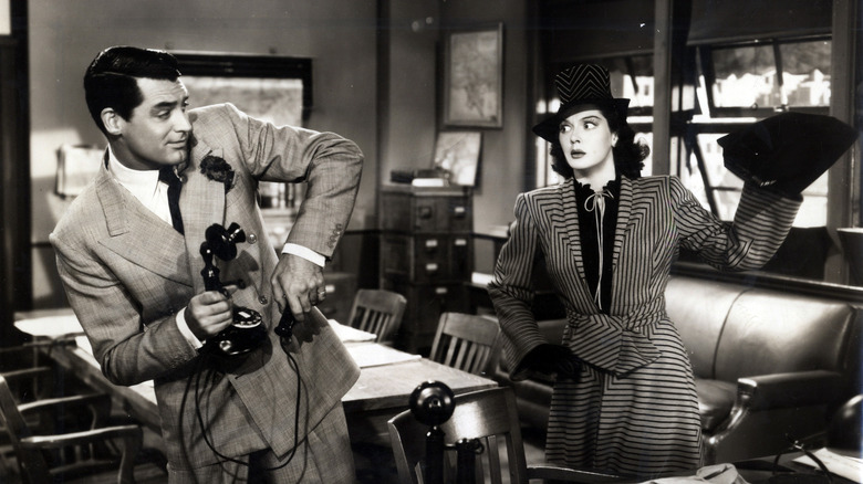Rosalind Russell Hilde Johnson is about to throw something in Carrie Grant Walter Burns in his girl on Friday