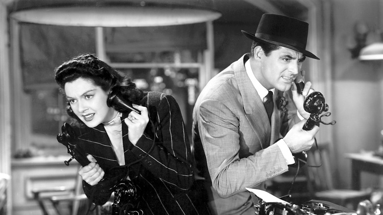 Rosalind Russell and Carrie Grant on the phones in his girl on Friday