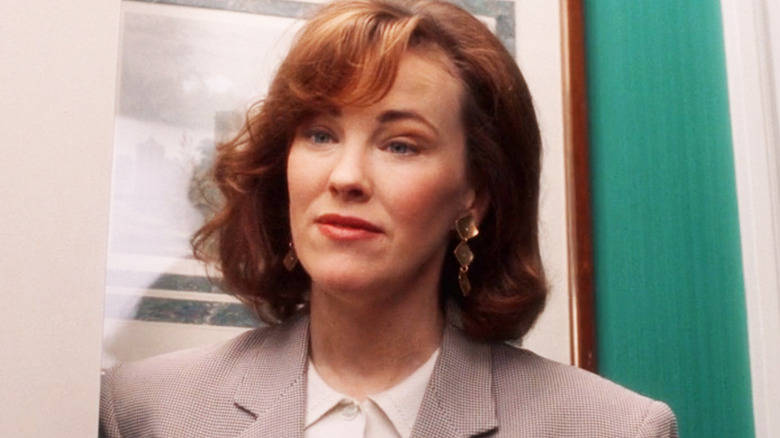 Catherine O'Hara's Kate McCallister is seen in closeup as she stands in her house in Home Alone