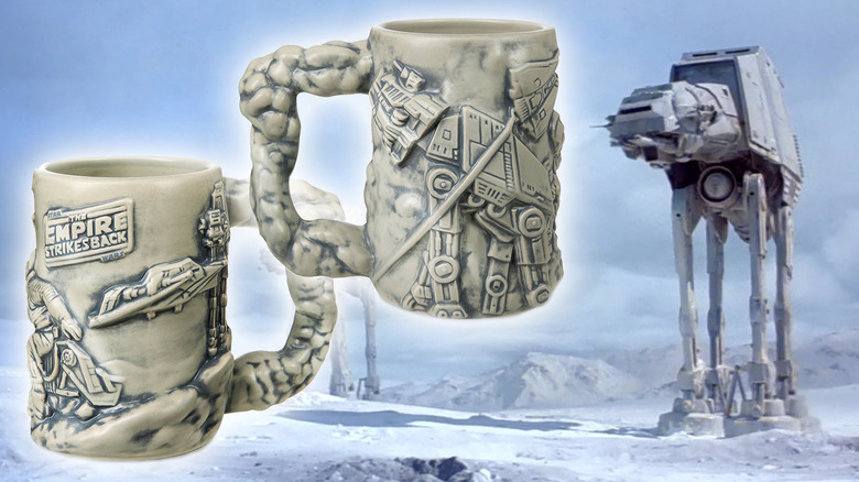Empire Strikes Back 45th anniversary mug next to an AT-AT