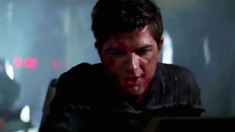 Adam Scott as an unnamed crew member of the USS Defiant in Star Trek: First Contact