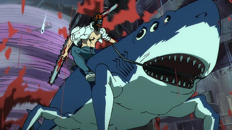 Denji riding a shark fiend into battle in Chainsaw Man - The Movie: Reze Arc