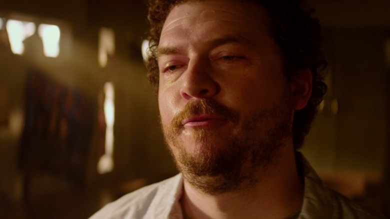 Danny McBride as himself looking amused in This Is the End