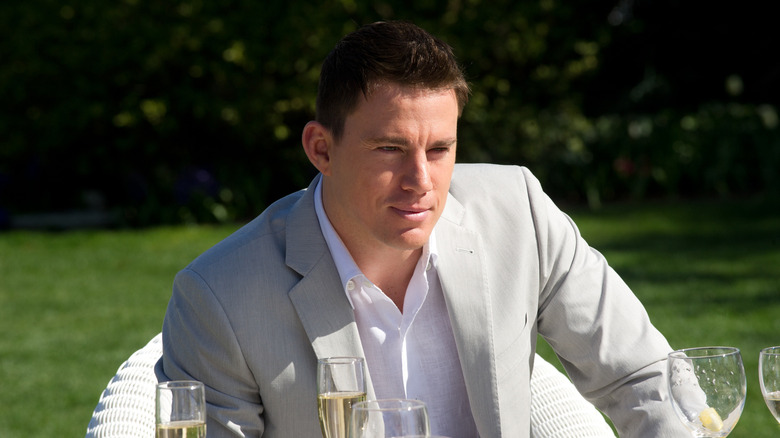 Channing Tatum as Martin Taylor sitting at a table outside in Side Effects