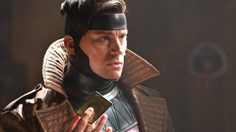 Channing Tatum suited up as Gambit and holding a playing card in Deadpool & Wolverine