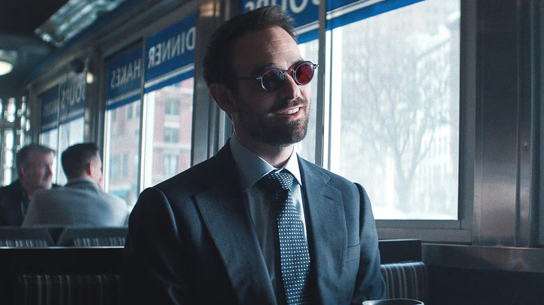 Charlie Cox as Matt Murdock smiling at a diner in Daredevil