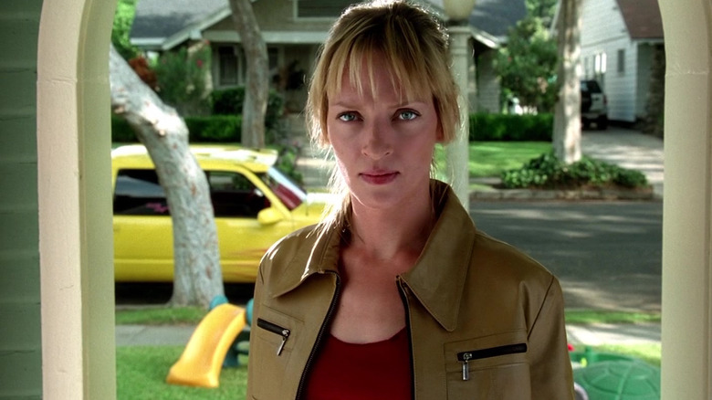 Beatrix standing in a doorway in Kill Bill: Volume 1