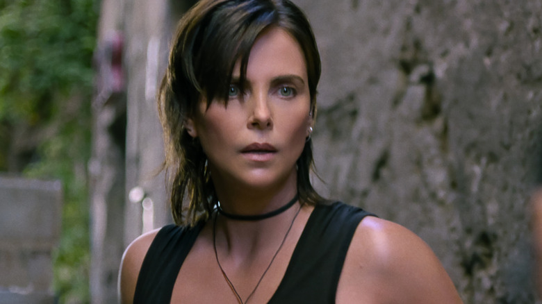 Charlize Theron as Andy looking surprised in The Old Guard 2