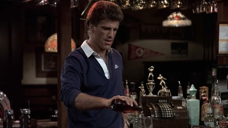 Ted Danson as Sam Malone pouring a beer in Cheers