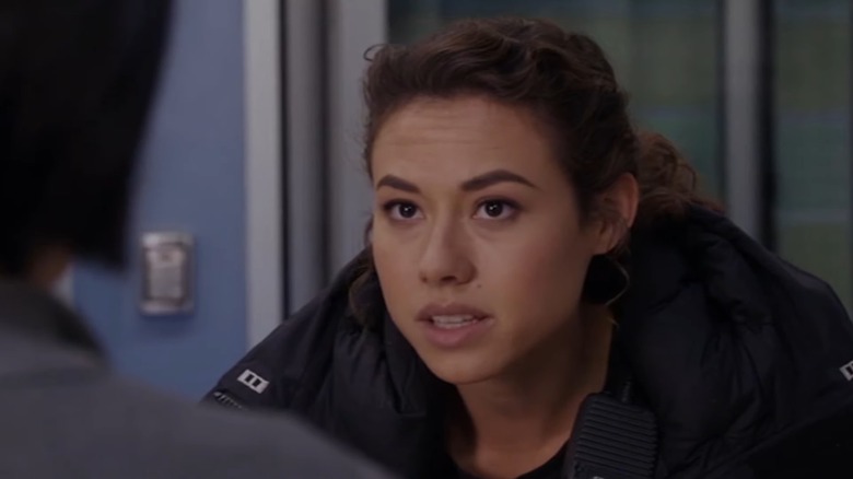 Dora Madison as Jessica 'Chili' Chilton in an oversized coat on Chicago Fire