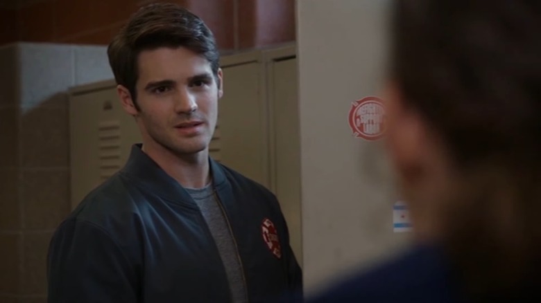 Steven R. McQueen as Jimmy Borrelli standing in front of an open locker on Chicago Fire
