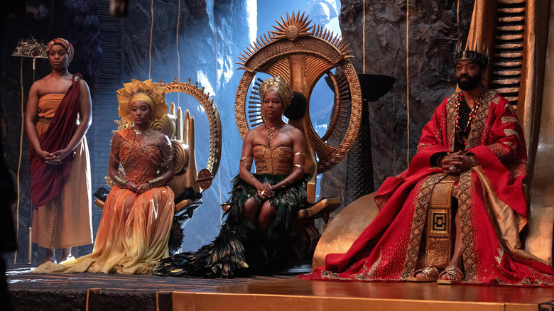 Zelie standing next to Princess Amari Queen Nehanda and King Saran in Children of Blood and Bone