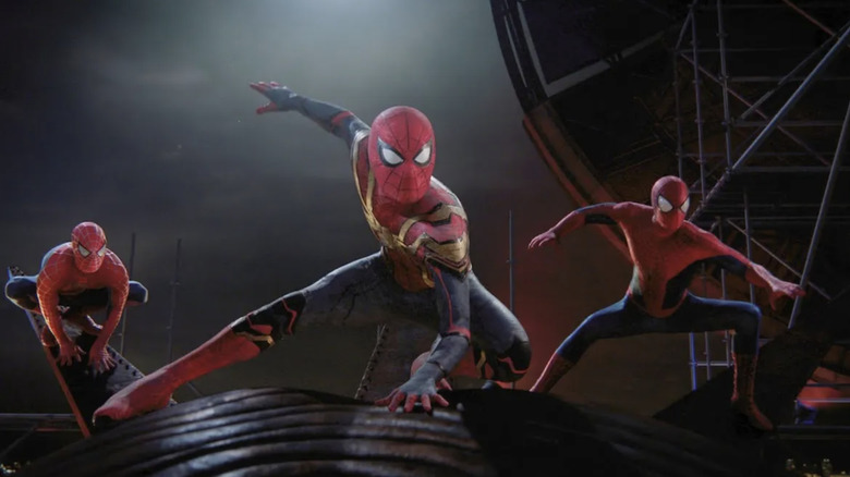 Multiple Spider-Men atop the Statue of Liberty