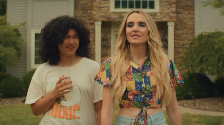 Chloe Fineman as Santa Monica walks alongside Sam Morelos as Abby Flores in Summer of 69