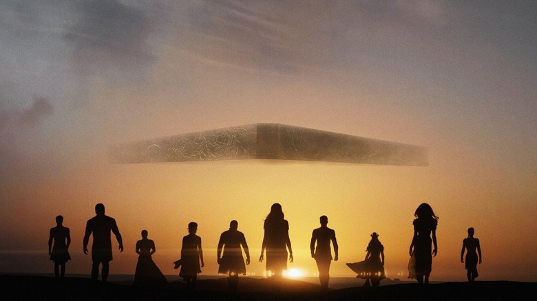 Eternals group with spaceship in background