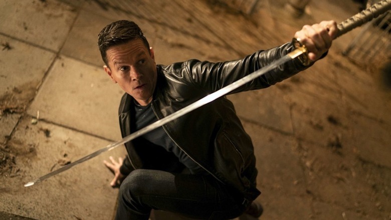 Mark Wahlberg looks confused wielding a katana as Evan McCauley in Infinite
