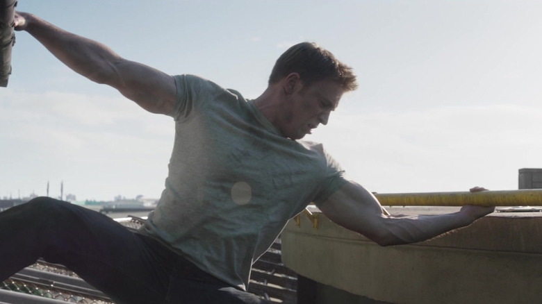 Steve Rogers holding onto a helicopter in Captain America: Civil War