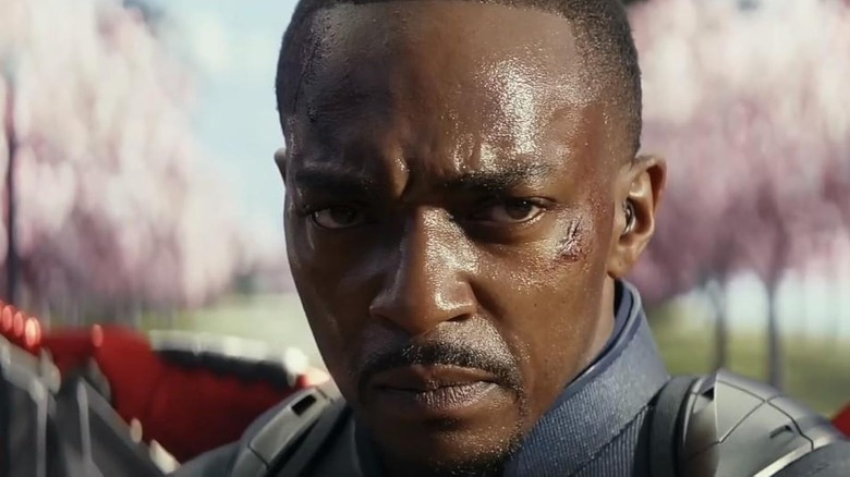 Sam Wilson staring intensely, his face covered in sweat, in Captain America: Brave New World