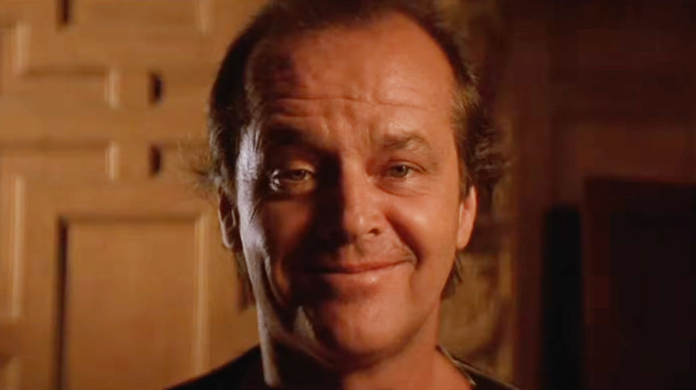 Jack Nicholson as Daryl Van Horne smiling mischievously in The Witches of Eastwick