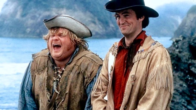 Chris Farley in the role of Bartholomeo Hunt and Matthew Perry in the role of Leslie Edwards laughs at the heroes