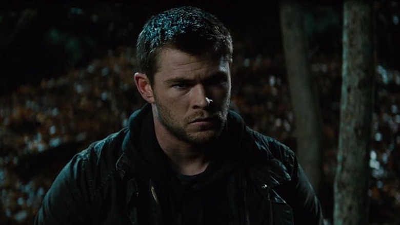 Chris Hemsworth looks lost and sad as Jed Eckert in Red Dawn