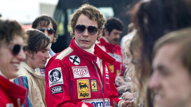 Daniel Bruhl as Niki Lauda signing autographs in Rush
