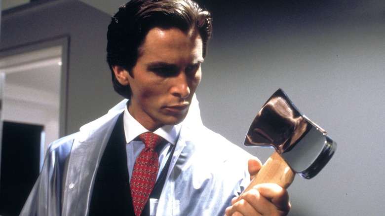 American Psycho Christian Bale looking at axe