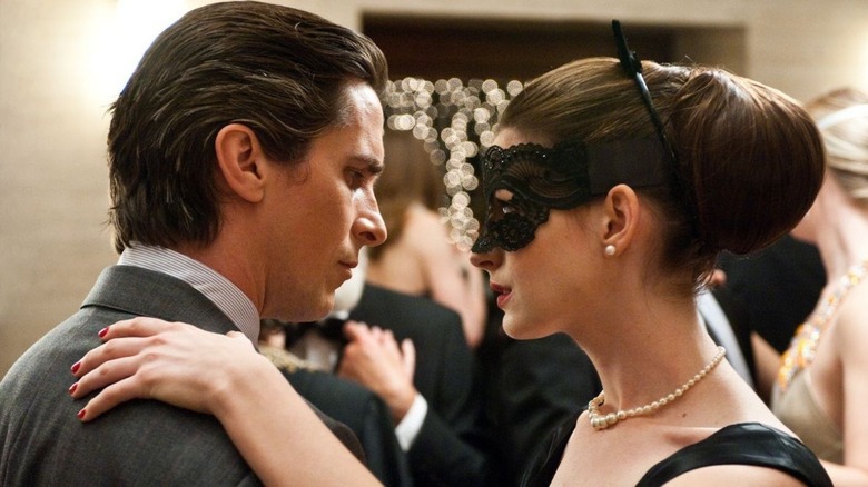 Christian Bale and Anne Hathaway as Bruce Wayne and Selina Kyle in The Dark Knight Rises