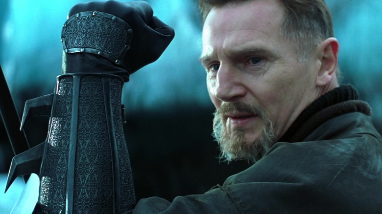 Ducard wielding gauntlets in Batman Begins